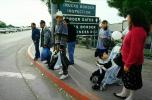 Woman, men, child, stroller, border crossing, PRAV01P03_13