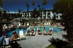 Poolside, Men, sun tanning, lounge chairs, Hotel, 1980s, RVLV01P15_05