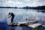 Grandpa Fishing with boys, fish, lake, bucolic, Michigan, 1958, 1950s, SFIV02P08_18