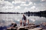 Grandpa Fishing with boys, fish, lake, bucolic, Michigan, 1958, 1950s, SFIV02P08_19