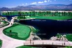 putting green, water hazard, bridge, paths, palm trees, mountain range, Palm Springs, SGFV01P10_05