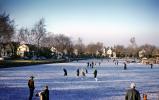 frozen pond, outdoor rink, homes, houses, buildings, SISV01P01_12