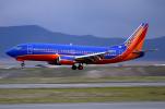N374SW, Boeing 737-3H4, Southwest Airlines SWA, Baggage Carts, 737-300 series, landing, TAFD02_126B