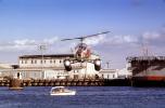 Santa Claus Delivering Presents, N9763Z, Bell 47G-2, San Pedro Harbor, docks, 1978, 1970s, TAHV04P06_11