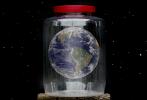 Earth Caught in a Jar, the inability for the earths thin atmosphere to cleanse human caused pollution, Photo-Illustration, TOPD01_044