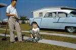 Girl in a Stroller, 1956 Chevy Bel Air, Father, Daughter, shovel, 1950s, VCRV23P14_08