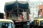 Man sits at the back of a truck, Mumbai (Bombay), India, VCTV01P02_08