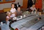 Girls and Boys Celebrating a Birthday around a Toy Train Set, 1950s, VRMV01P13_14